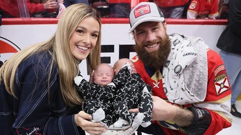 Panthers' Jonah Gadjovich, wife Allison pose with newborn twins in Stanley Cup